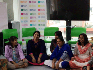 Teachers sharing a light moment during workshop